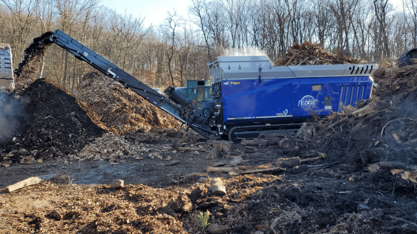 industrial shredder recycling wood waste into mulch